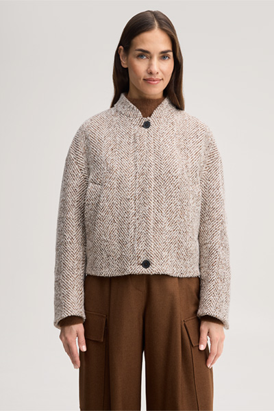 Leads to product detail page "Wool-blend tweed jacket in herringbone ecru, brown and grey"