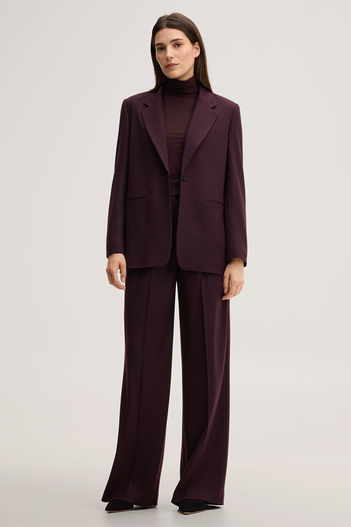 Leads to look detail page “<p><strong>Shop the Look:</strong><br> Wool Jersey Flannel Pantsuit in Dark Red</p>”