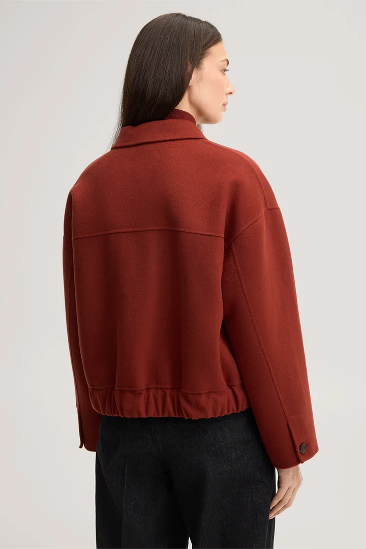 Leads to product detail page "Double-faced shirt jacket in dark red"