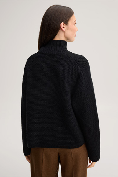 Leads to product detail page "Black cashmere stand-up collar jumper"