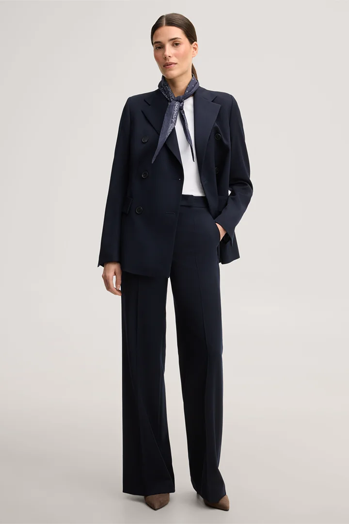 Leads to product detail page "Navy virgin wool crêpe Marlene trousers"