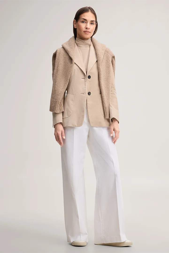 Leads to product detail page "Beige corduroy blazer"