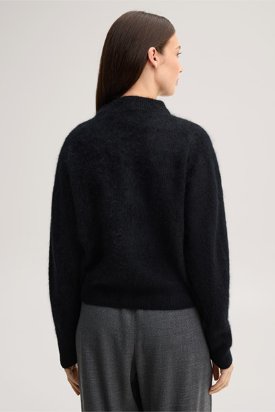 Leads to product detail page "Brushed cashmere jumper with a stand-up collar in black"