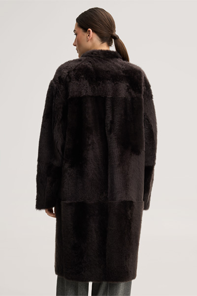 Leads to product detail page "Reversible lambskin coat in dark brown"