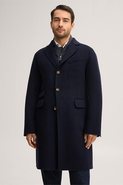 Leads to product detail page "Double-faced woollen coat with lapels in navy blue"