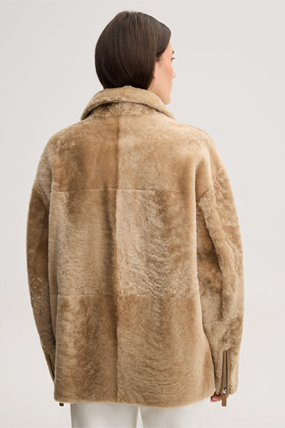 Leads to product detail page "Beige lambskin biker jacket with zip"