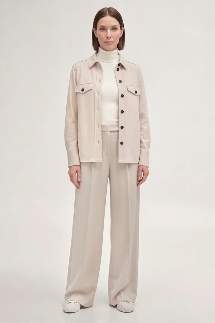 Leads to product detail page "Wool jersey marlene trousers with wide legs in light beige"
