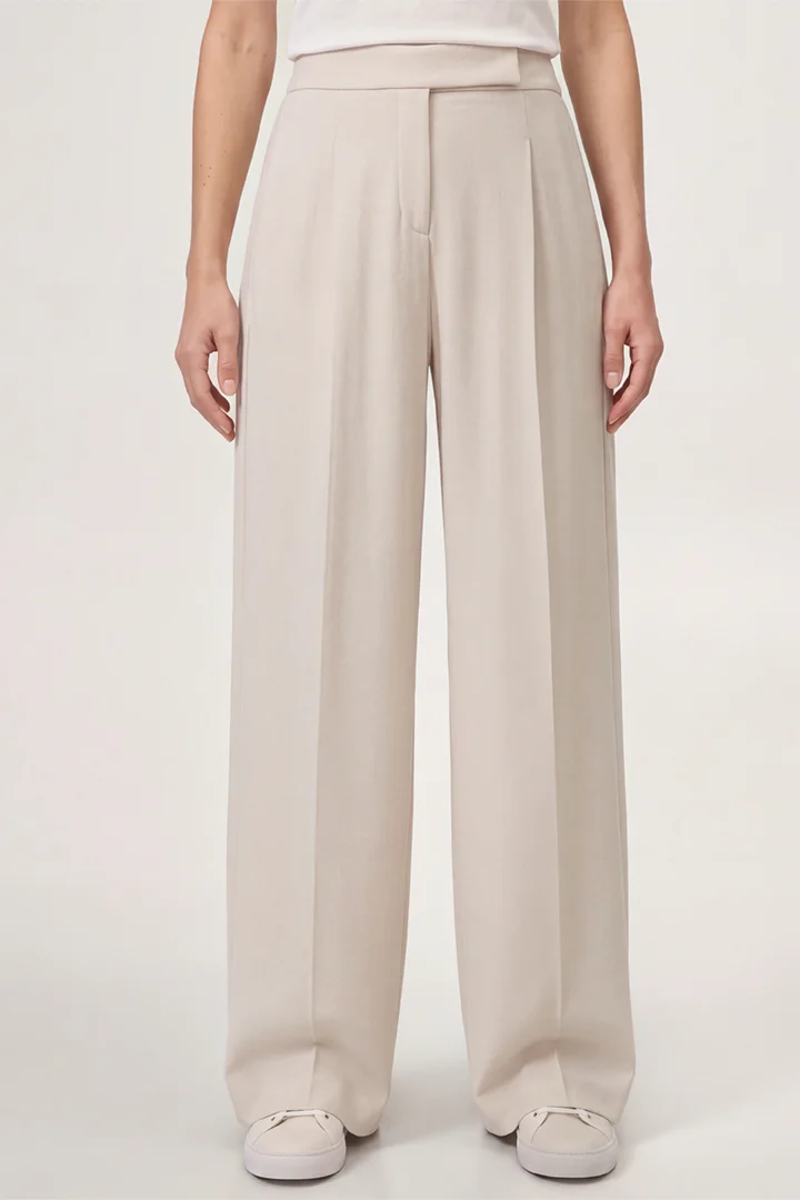 Leads to product detail page "Wool jersey marlene trousers with wide legs in light beige"
