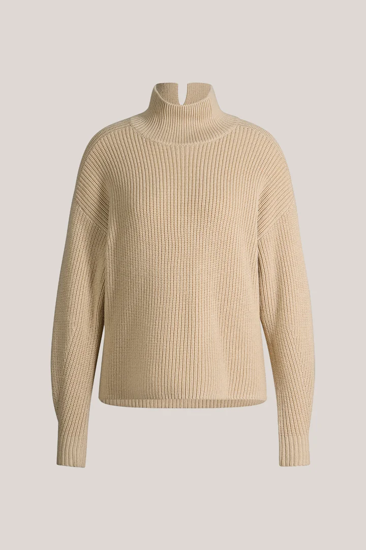 Leads to product detail page "Beige merino wool jumper with a stand-up collar"