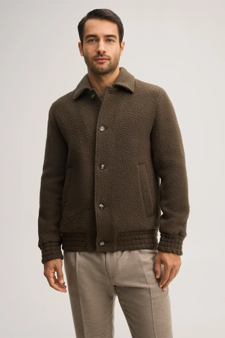 Leads to product detail page "Virgin wool blend jacket with a shirt collar in olive"