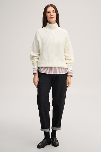 Leads to product detail page "Ecru merino wool jumper with a stand-up collar"