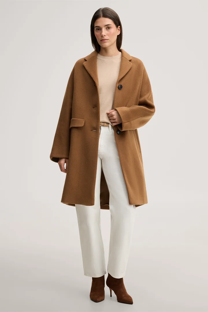 Leads to product detail page "Brushed wool short coat in caramel"