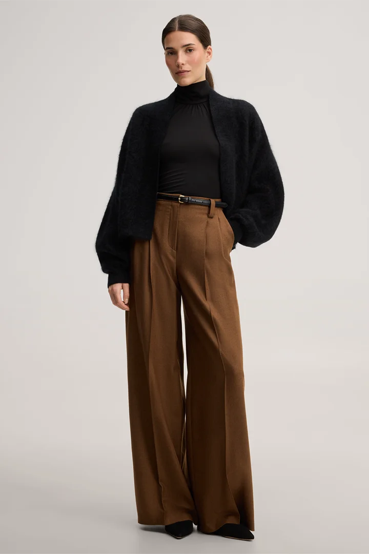 Leads to product detail page "Brushed cashmere cape jacket in black"