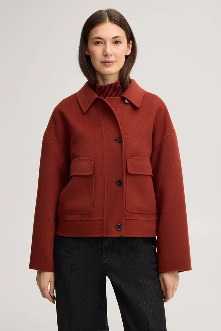Leads to product detail page "Double-faced shirt jacket in dark red"