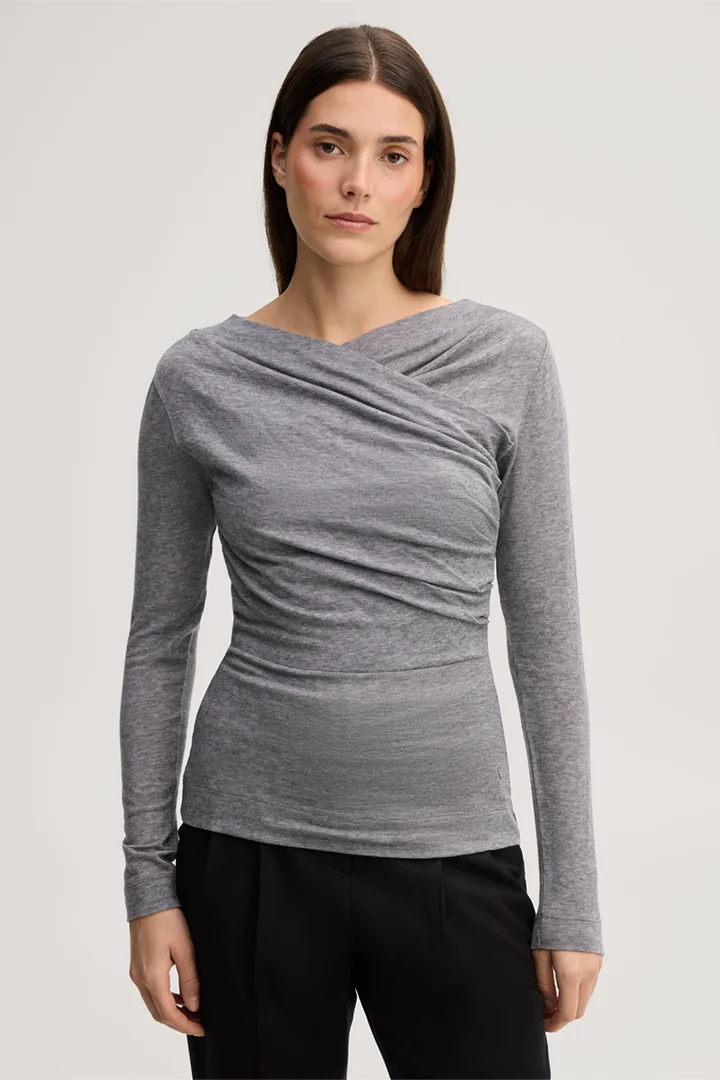 Führt zu Produktdetailseite „Wollstretch-Langarm-Shirt in Hellgrau"