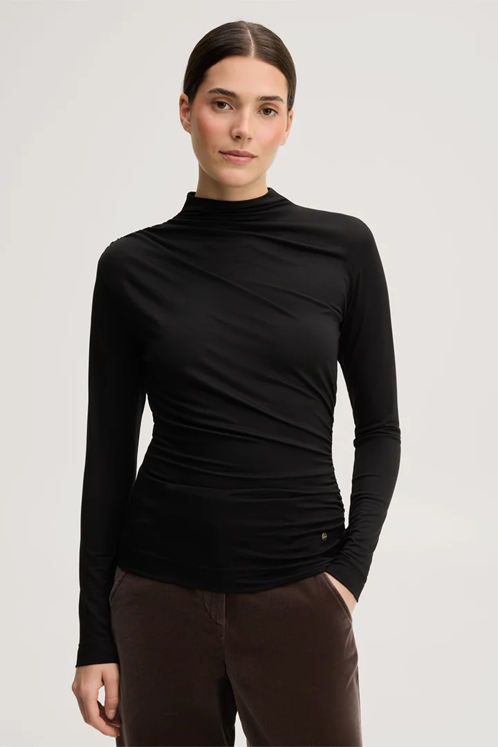 Leads to product detail page "Black lyocell stretch jumper with a stand-up collar"
