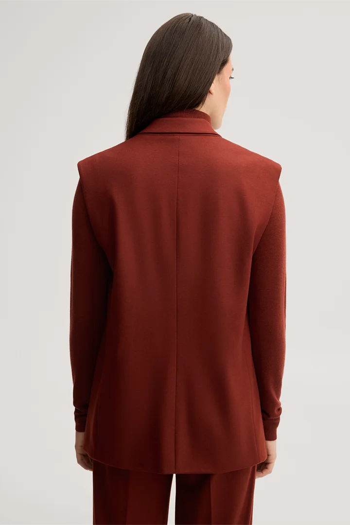 Leads to product detail page "Dark red flannel and woollen jersey waistcoat"