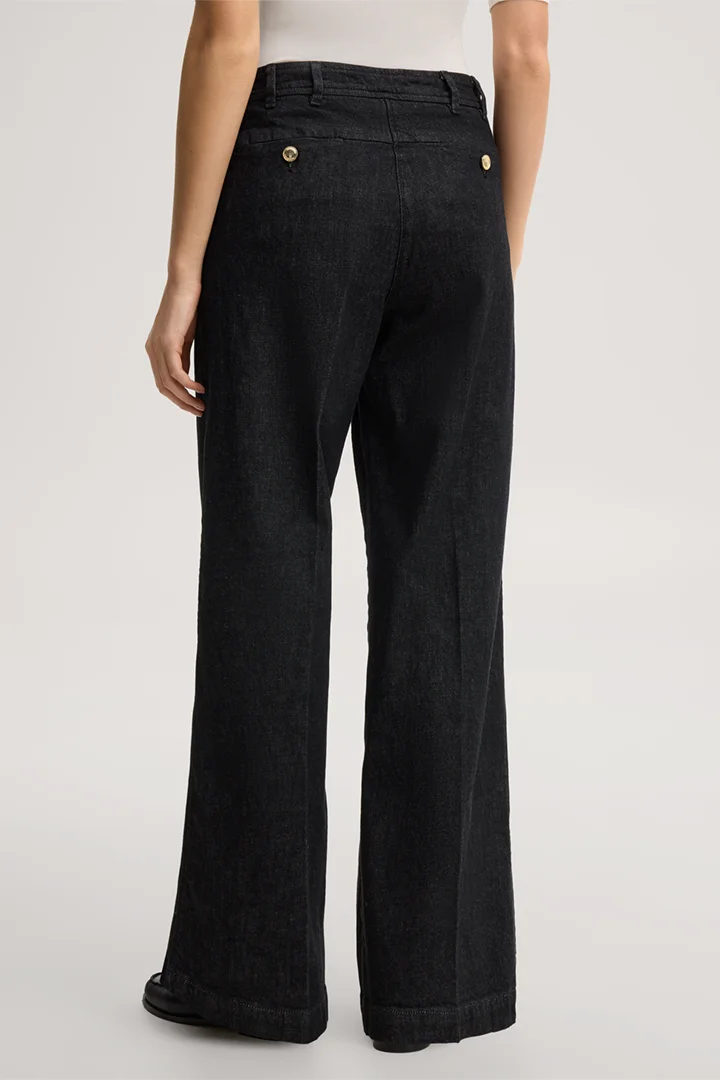 Leads to product detail page "Palazzo five-pocket jeans in black denim"
