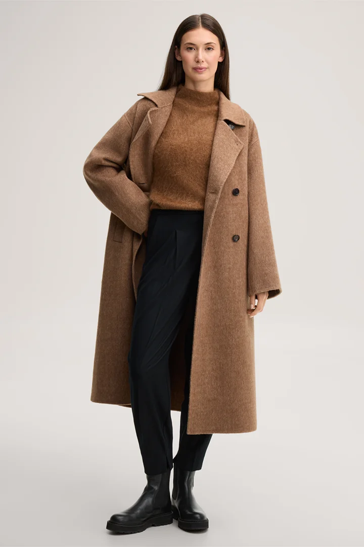 Leads to product detail page "Brushed cashmere jumper with a stand-up collar in caramel"