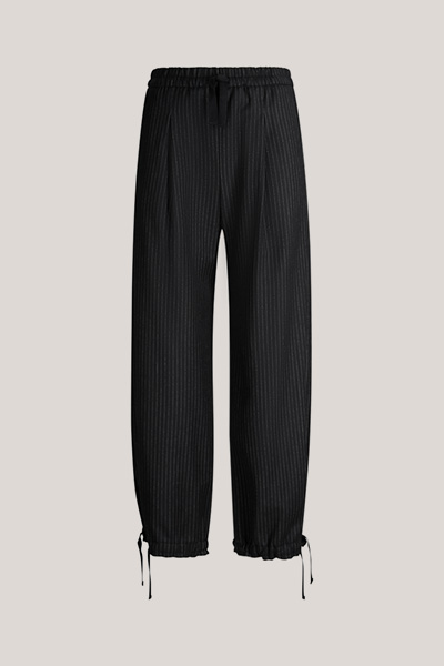 Leads to product detail page "Black virgin wool pinstripe balloon trousers"