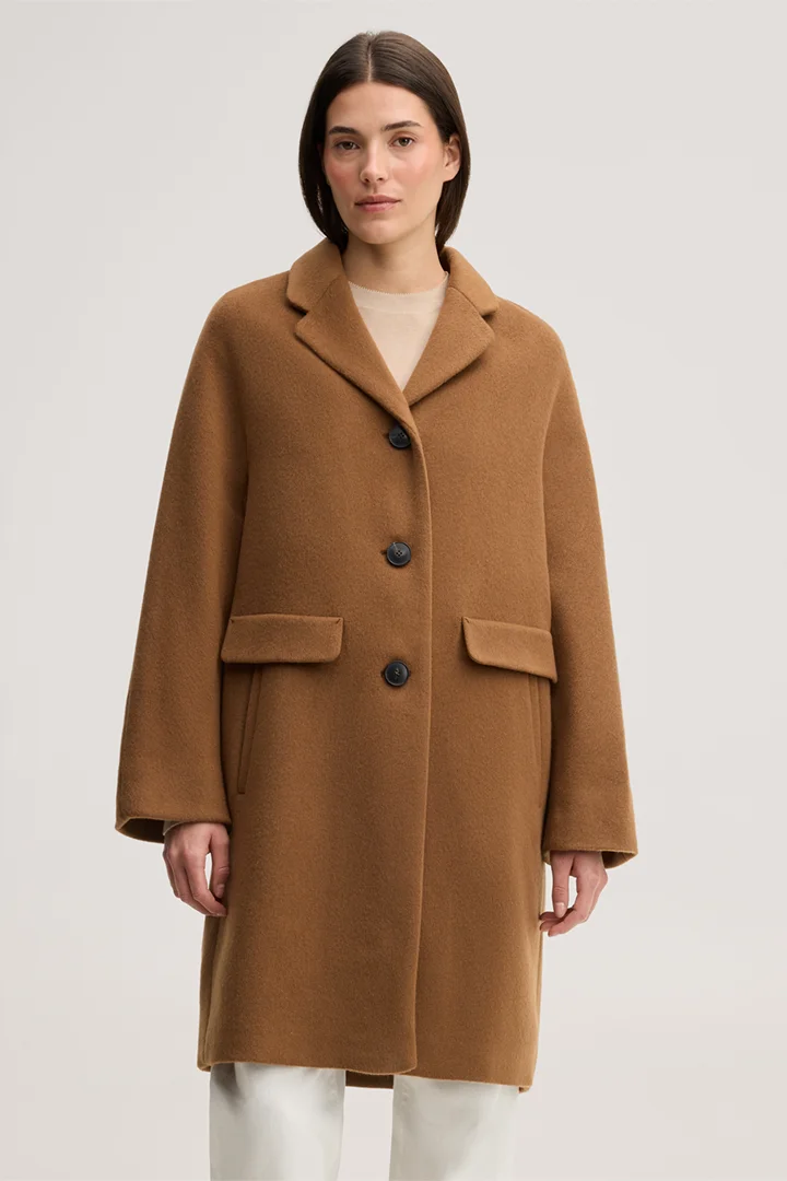 Leads to product detail page "Brushed wool short coat in caramel"