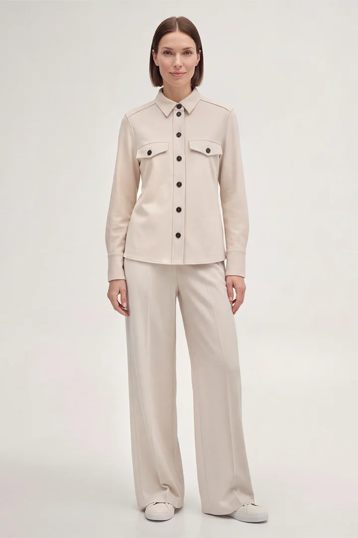 Leads to product detail page "Wool Jersey Shirt-style Blouse in Light Beige"