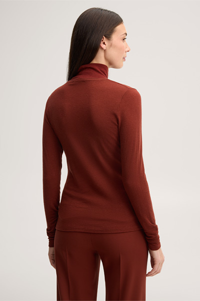 Führt zu Produktdetailseite „Wollstretch-Rollkragen-Shirt in Dunkelrot"