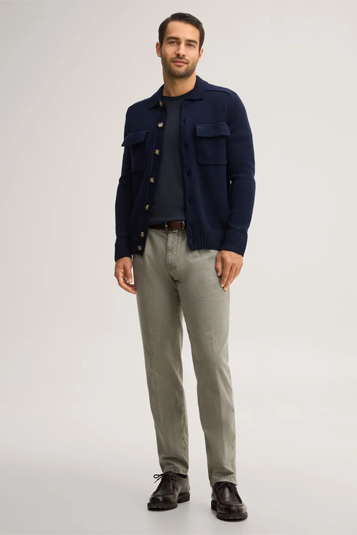 Leads to product detail page "Navy blue virgin wool knitted overshirt with a shirt collar"
