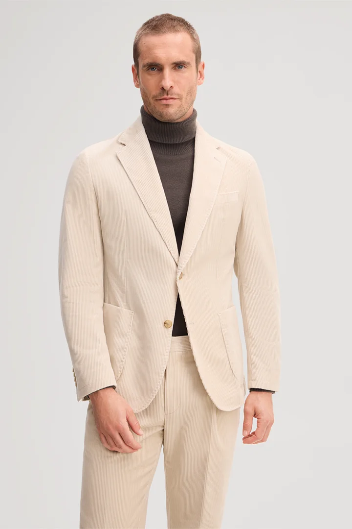 Mène à la page produit « Veste en velours côtelé beige »