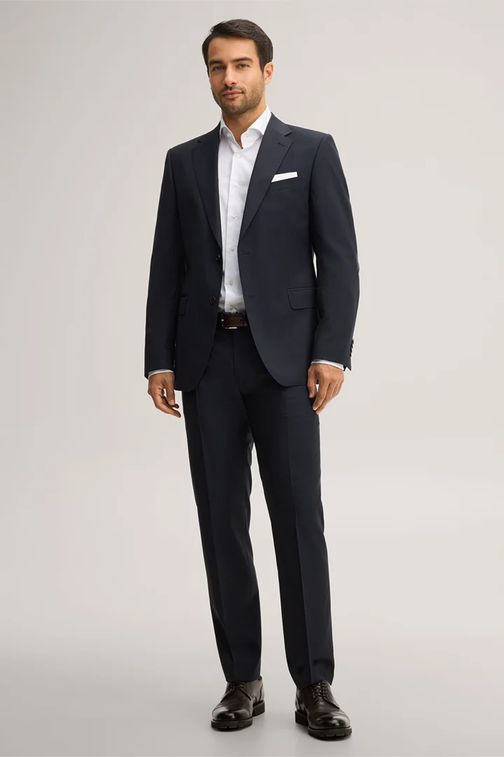 Leads to product detail page "Navy blue marl virgin wool suit"