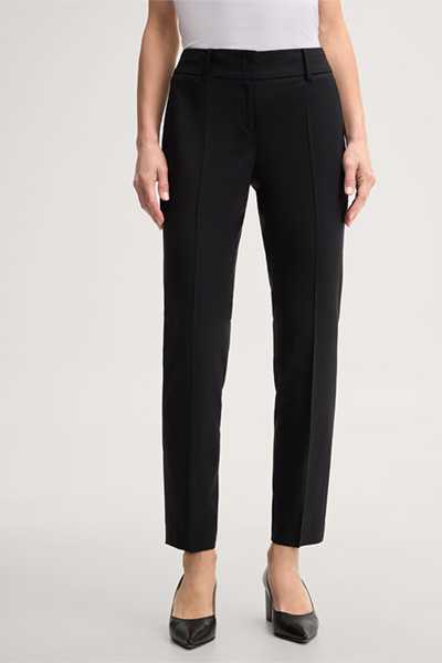 Leads to product detail page "Black virgin wool stretch cigarette pants"