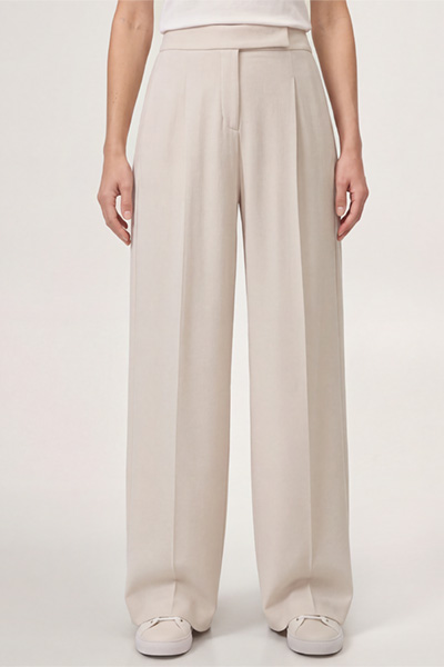 Leads to product detail page "Wool jersey marlene trousers with wide legs in light beige"