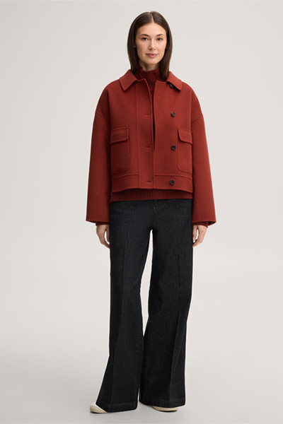 Leads to product detail page "Dark red merino woollen jumper with a stand-up collar"