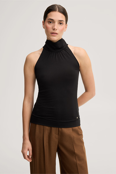 Leads to product detail page "Black lyocell stretch top with a stand-up collar"