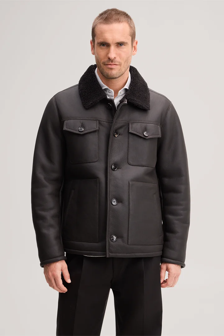 Führt zu Produktdetailseite „Lammfell-Lederjacke in Dunkelbraun"