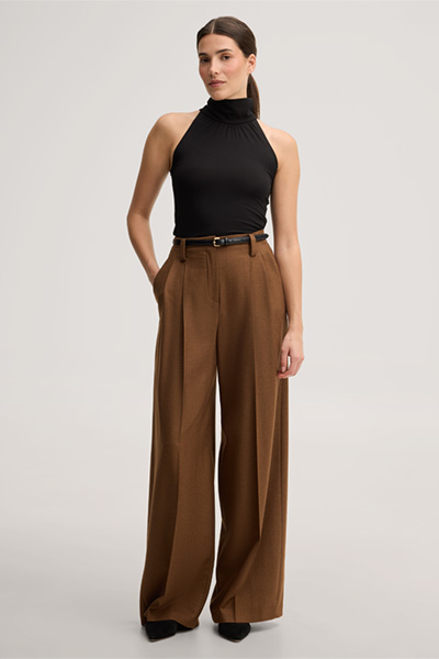 Leads to product detail page "Black lyocell stretch top with a stand-up collar"