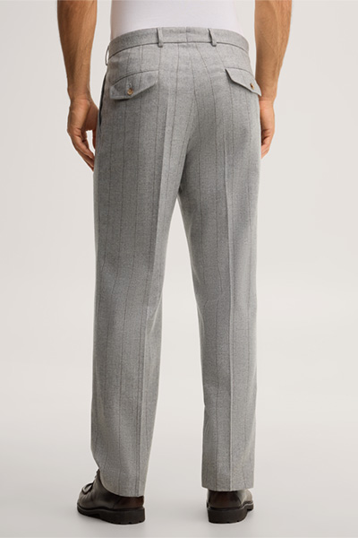 Leads to product detail page "Wool-blend modular trousers with pleats at the waist in grey with pinstripes"