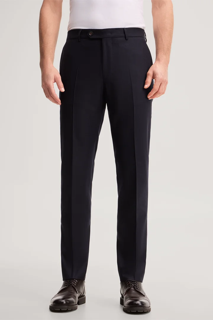 Führt zu Produktdetailseite „Wool-blend modular trousers in navy blue"