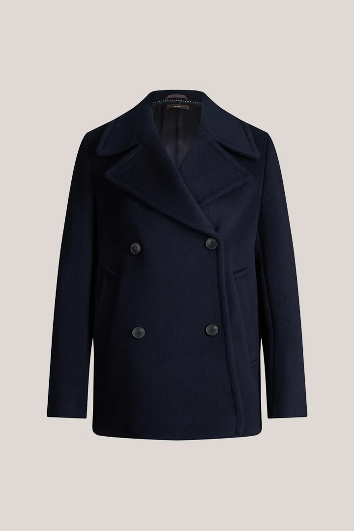Leads to product detail page "Brushed wool pea coat in navy blue"