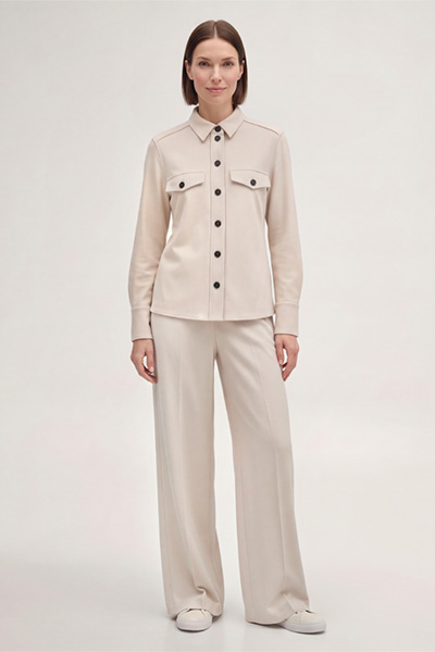 Leads to product detail page "Wool Jersey Shirt-style Blouse in Light Beige"