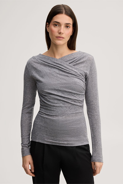 Führt zu Produktdetailseite „Wollstretch-Langarm-Shirt in Hellgrau"