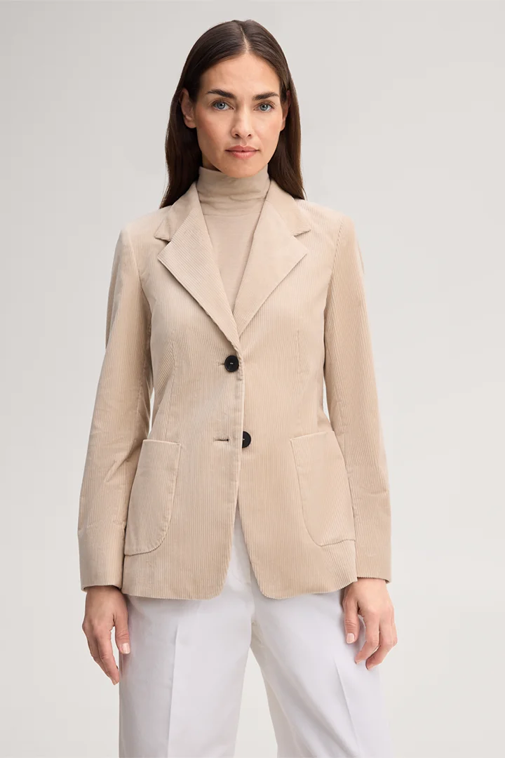 Leads to product detail page "Beige corduroy blazer"