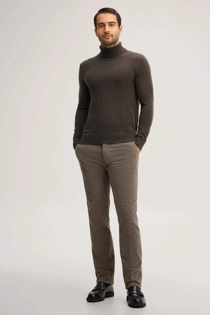 Leads to product detail page "Olive cashmere roll-neck jumper"