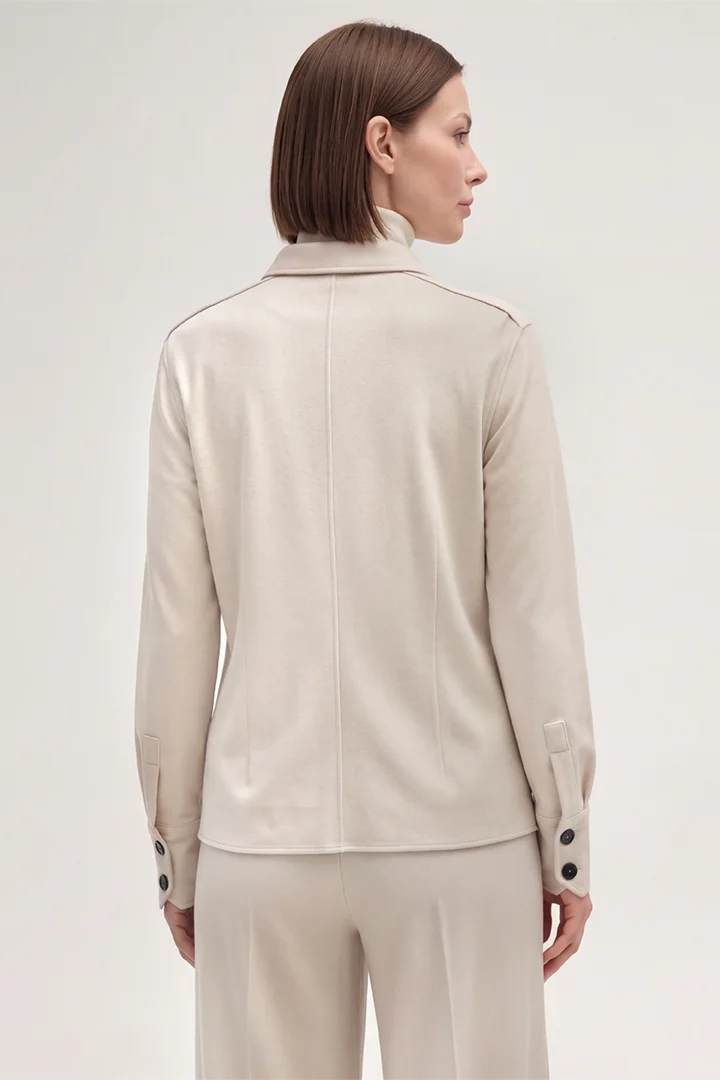 Führt zu Produktdetailseite „Wolljersey-Hemdbluse in Hellbeige"