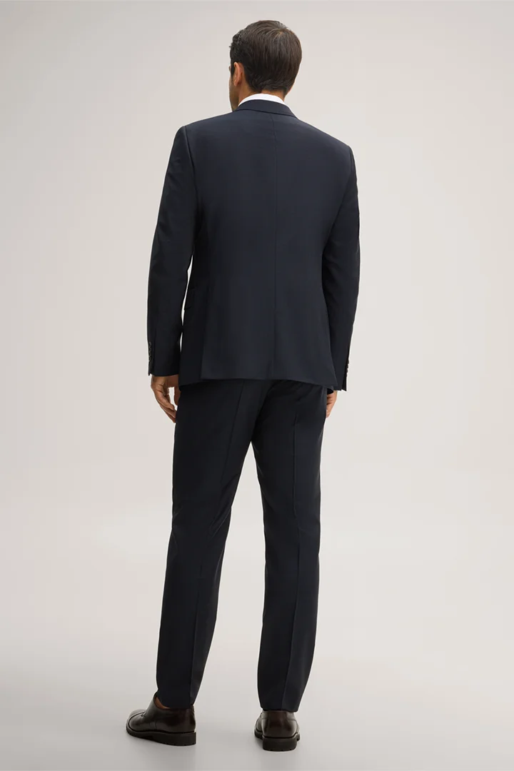 Leads to product detail page "Navy blue marl virgin wool suit"