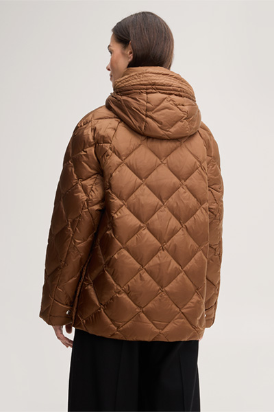 Leads to product detail page "Nylon quilted jacket with a stand-up collar in caramel"