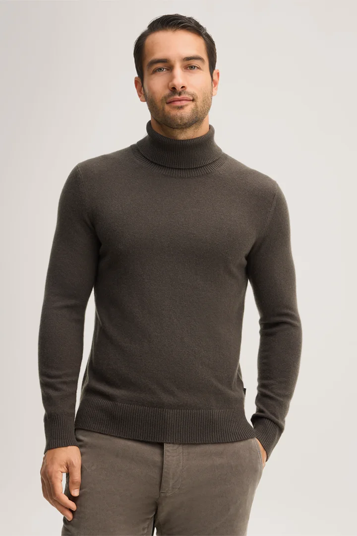 Leads to product detail page "Olive cashmere roll-neck jumper"