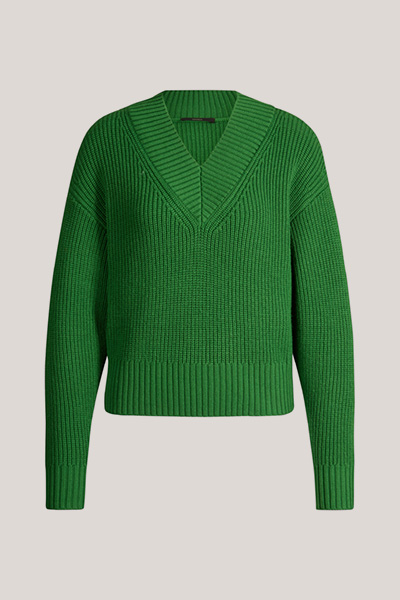 Leads to product detail page "Green merino wool v-neck jumper"