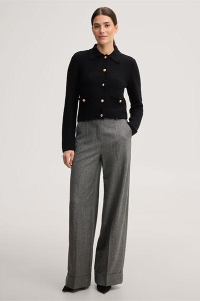 Leads to product detail page "Black fringed tweed knitted cardigan"
