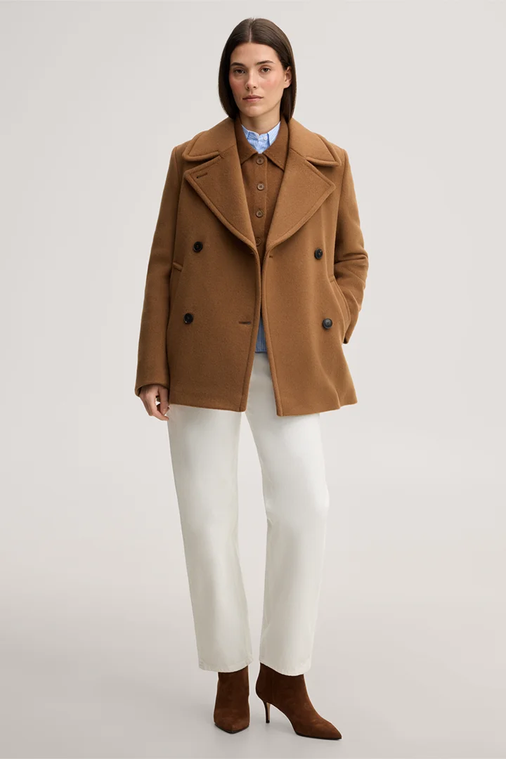 Leads to product detail page "Brushed wool pea coat in caramel"